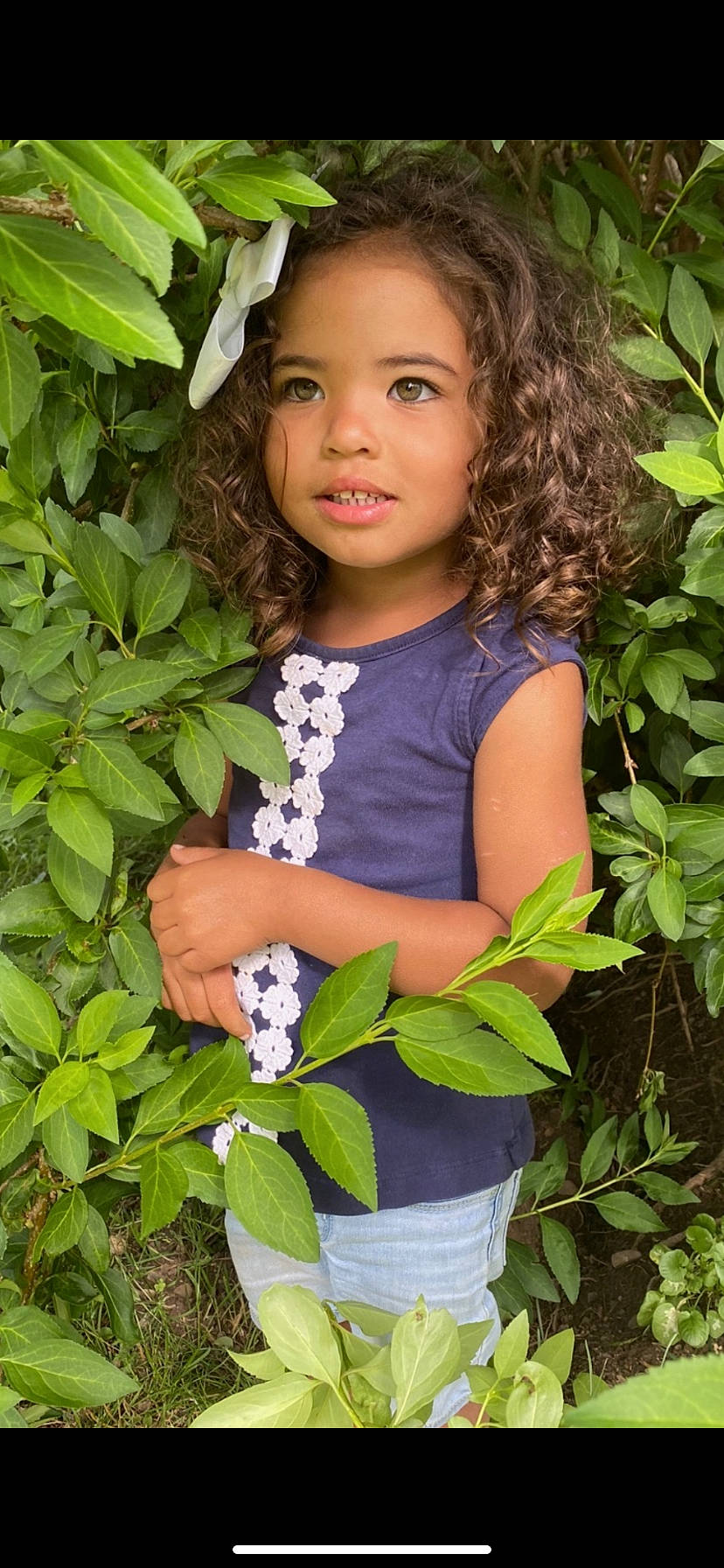 Michaela is registered to the contest to win money with this photo: botany, child, child_model, fawn, flower, ivy, leaf, neck, person, photo_shoot, plant, smile, toddler