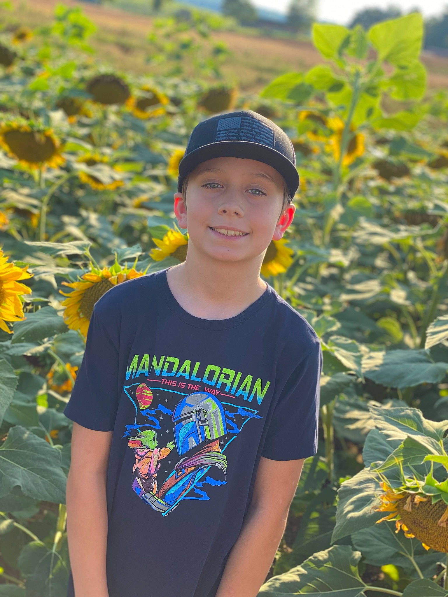 Colton joined the competition — help win amazing prizes! agriculture, botany, cap, clothing, eye, flower, grass, happy, hat, head, headgear, headwear, joy, leaf, leisure, people_in_nature, person, plant, smile, summer