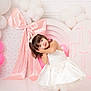 Mía Blanca is registered to the contest to win money with this photo: balloons, bow, celebration, child, confetti, decorations, girl, headband, party, pastel_background, pink_bow, portrait, pose, princess, satin_dress, shoes, studio_shot, toddler, tulle, white_dress