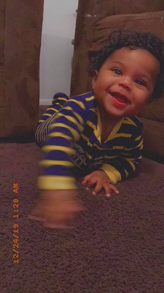 Jasean is registered to the contest to win money with this photo: baby, cheek, child, crawling, eye, face, facial_expression, fun, head, nose, person, play, sitting, skin, smile, toddler