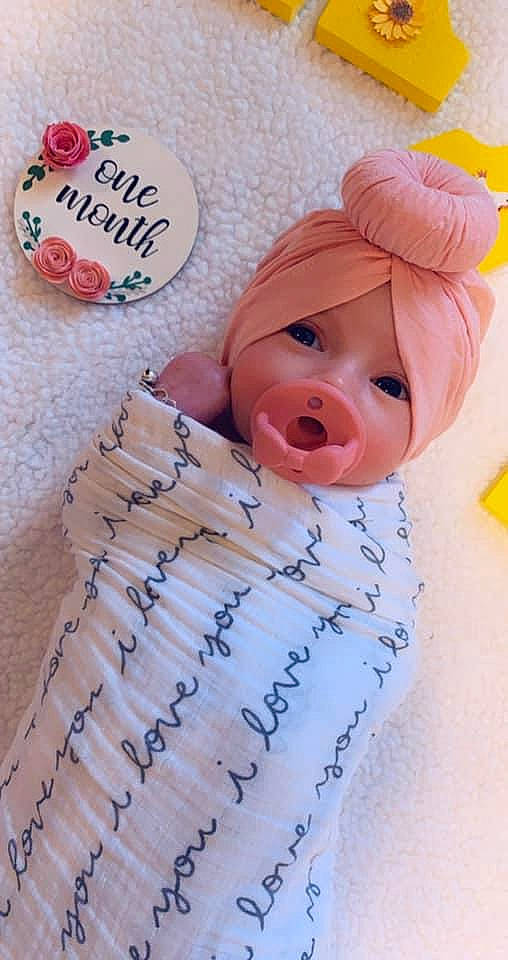 Ryder is registered to the contest to win money with this photo: baby, baby_products, baby_toddler_clothing, carmine, cheek, child, finger, font, handwriting, happy, illustration, linens, nail, nose, peach, person, product, sweetness, textile, toddler