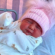 Bonnie joined the competition — help win amazing prizes! newborn, baby, sleeping, pink_hat, onesie, animal_print, infant, cute, cozy, soft, bed, blanket, portrait, closeup, face, child, indoor, rest, peaceful, headwear