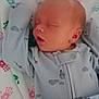 Cleo joined the competition — help win amazing prizes! baby, sleeping, newborn, pajamas, blanket, handprints, infant, face, head, peaceful, resting, cozy, child, soft, cute, small, portrait, indoors, wearing, clothing