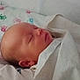 Cleo joined the competition — help win amazing prizes! newborn, baby, sleeping, blanket, pacifier, bed, infant, face, child, soft, white, peaceful, cute, indoors, resting, pajamas, closeup, head, wrapped, comfort
