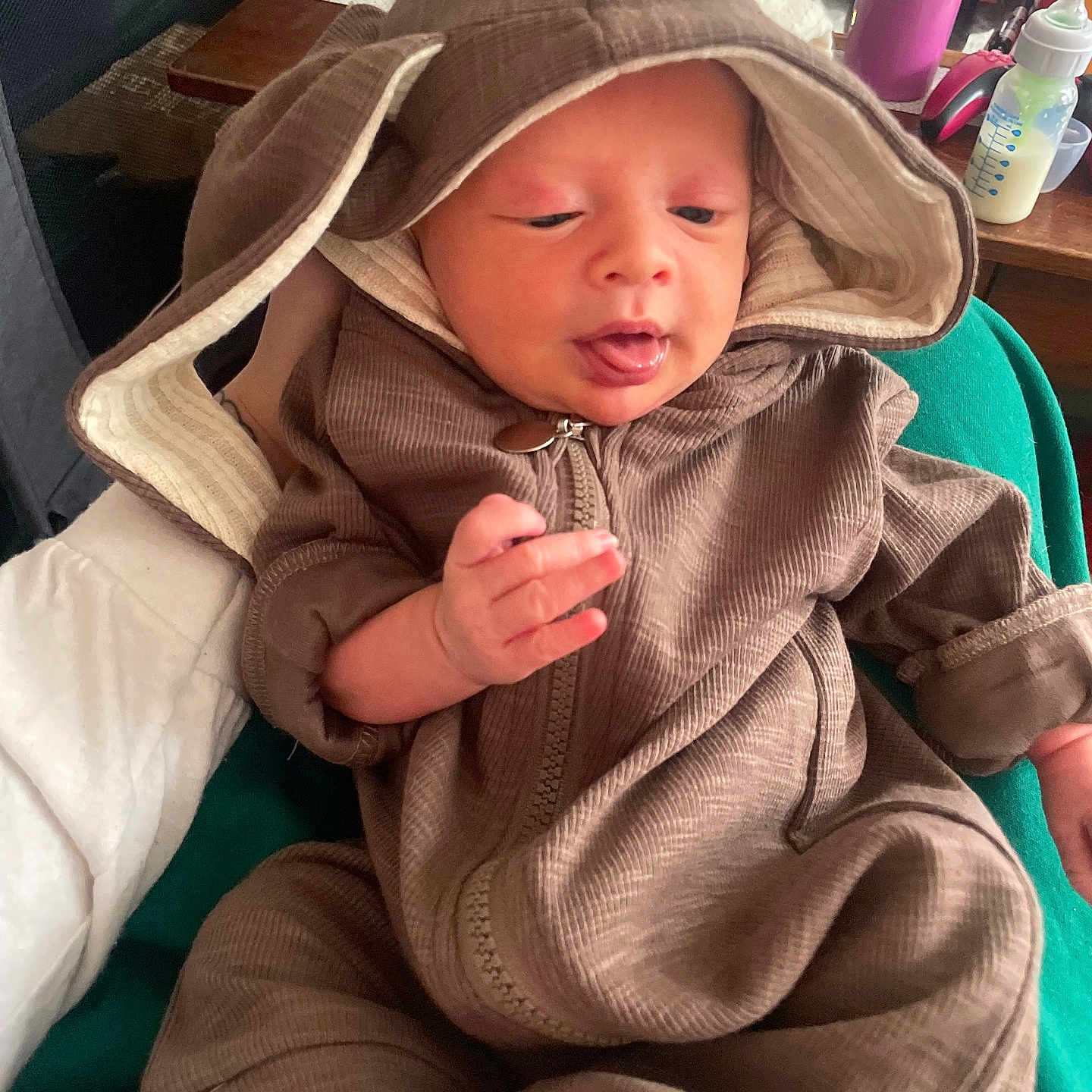 Theodore joined the competition — help win amazing prizes! baby, blanket, bodypart, bonnet, clothing, coat, face, finger, hand, hat, head, hood, hoodie, jacket, knitwear, person, photography, portrait, sweater, sweatshirt