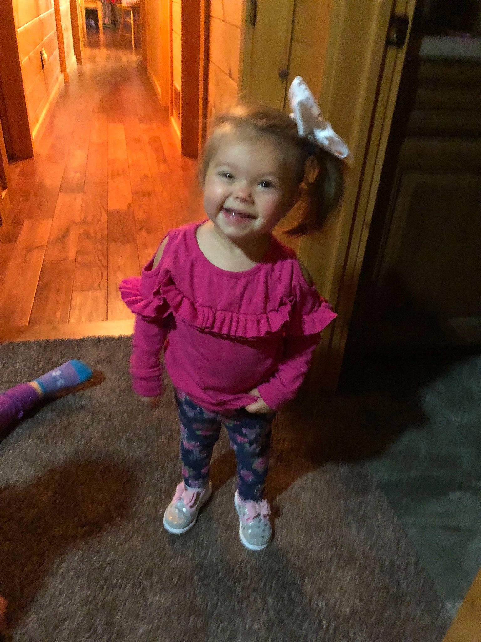 Payson is registered to the contest to win money with this photo: baby, cheek, child, eye, face, floor, flooring, fun, head, joy, person, pink, play, skin, smile, standing, toddler, wood