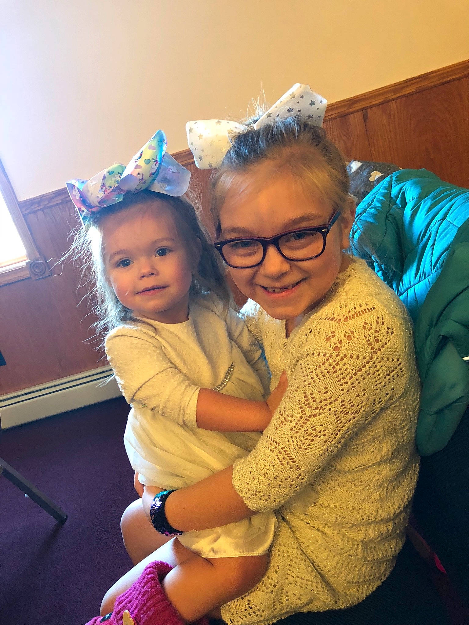 Abrianna is registered to the contest to win money with this photo: baby, birth, child, daughter, ear, family, fun, glasses, grandparent, happy, head, hug, iris, joy, mother, people, person, sitting, skin, smile