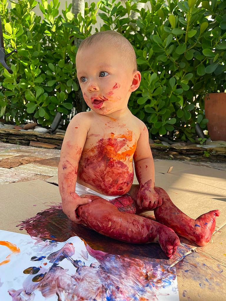 Emiliano joined the competition — help win amazing prizes! art, baby, barefoot, child, flesh, foot, fun, garden, grass, human_body, human_leg, leisure, meat, person, pink, plant, sitting, soil, surprise, thigh