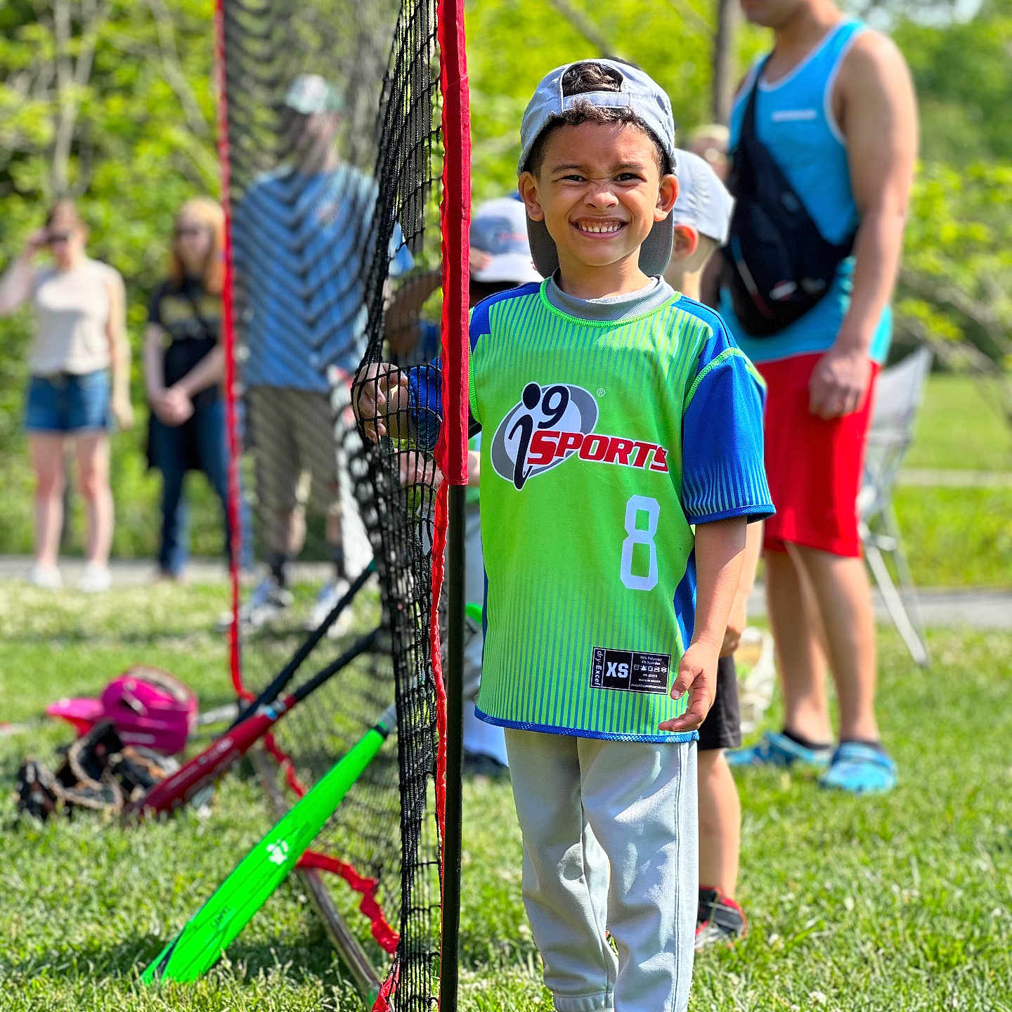 Kayden joined the competition — help win amazing prizes! ball, baseballcap, cap, clothing, face, football, grass, hat, nature, outdoors, park, people, person, plant, shorts, soccer, soccerball, sport, t_shirt, walking