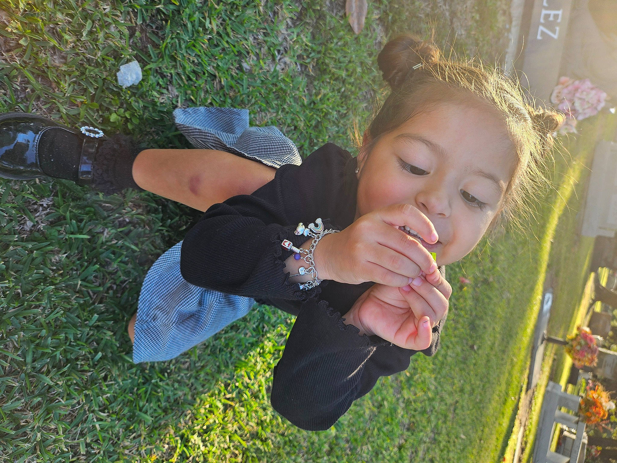 Camila is registered to the contest to win money with this photo: child, fashion_accessory, fun, gesture, grass, happy, jewellery, laugh, leisure, people_in_nature, person, plant, portrait_photography, sitting, toddler