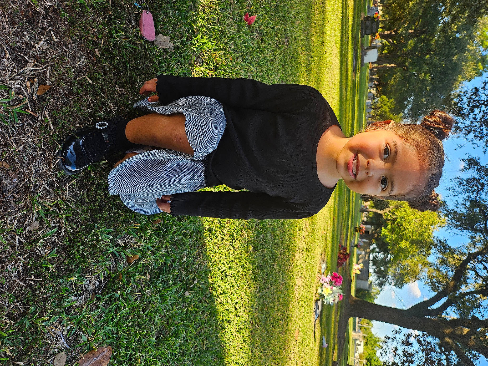 Camila is registered to the contest to win money with this photo: child, fun, garden, gesture, grass, happy, joy, leisure, people_in_nature, person, plant, shrub, sky, smile, t_shirt, toddler, tree