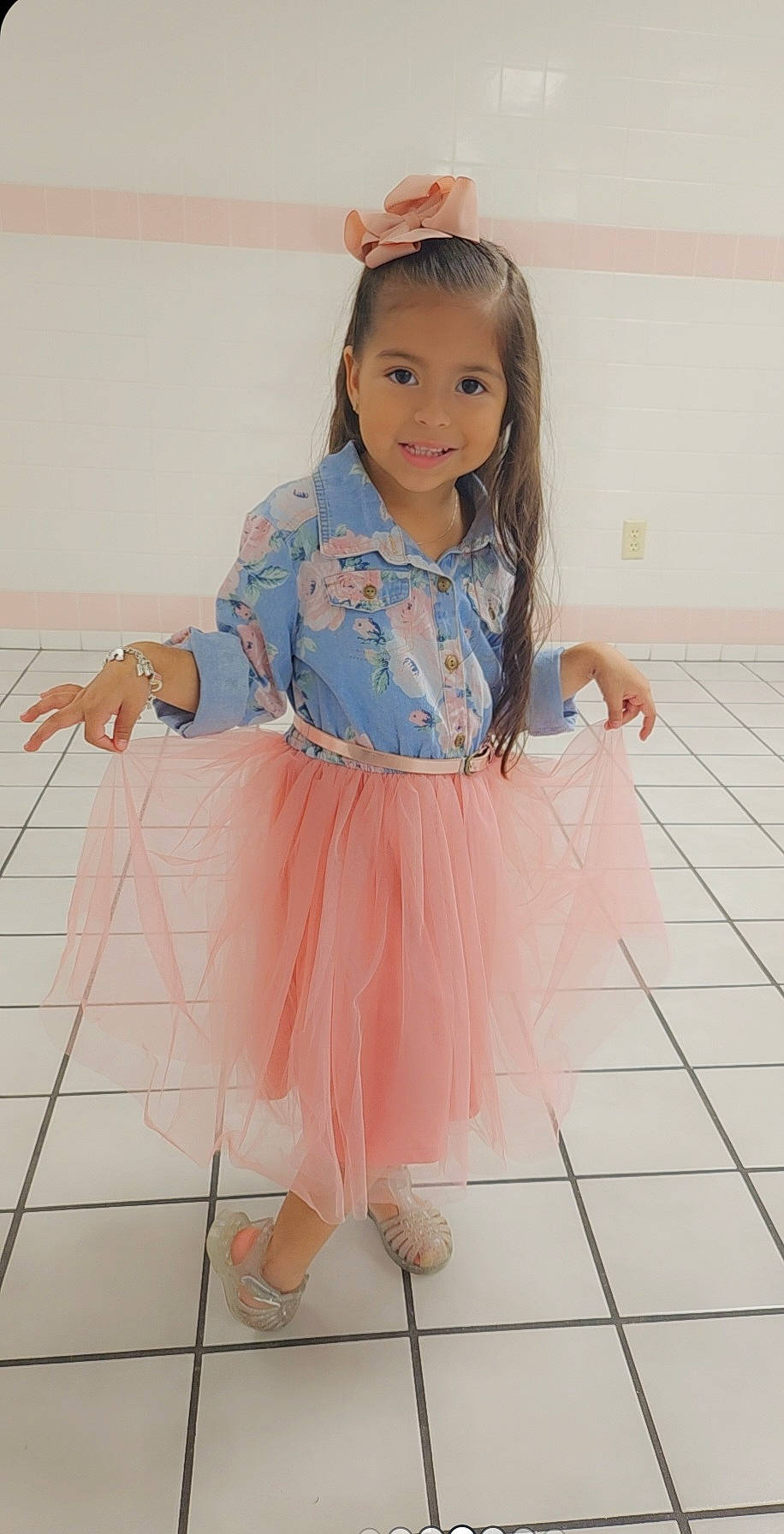 Camila is registered to the contest to win money with this photo: baby_toddler_clothing, child, dance, day_dress, electric_blue, event, eye, face, flooring, hair, happy, human_leg, joy, magenta, pattern, person, pink, sleeve, smile, thigh