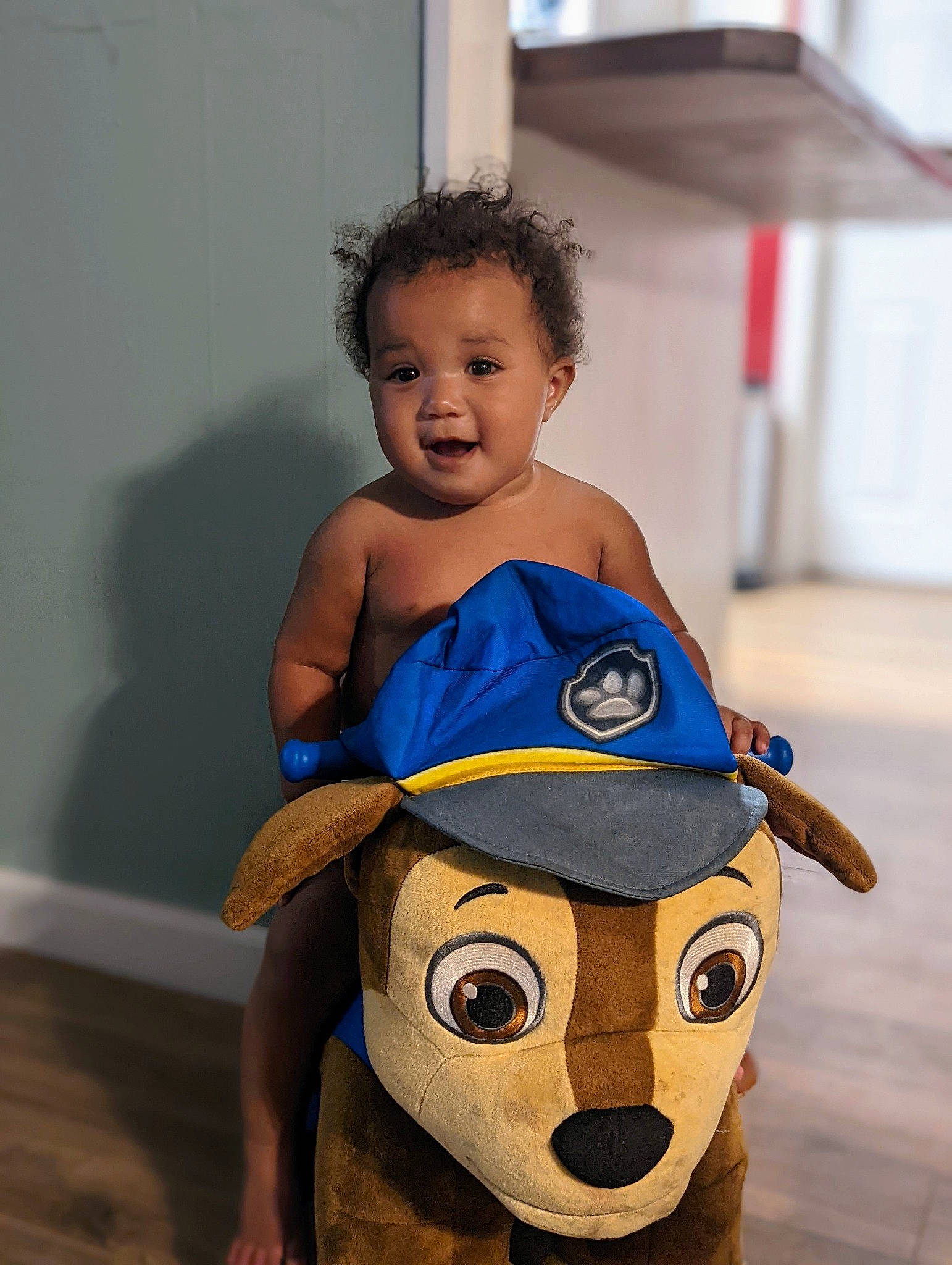 Talia joined the competition — help win amazing prizes! abdomen, baby, baby_toddler_clothing, chest, child, electric_blue, flooring, fun, happy, human_leg, person, sitting, skin, sleeve, smile, standing, stuffed_toy, t_shirt, toddler, toy