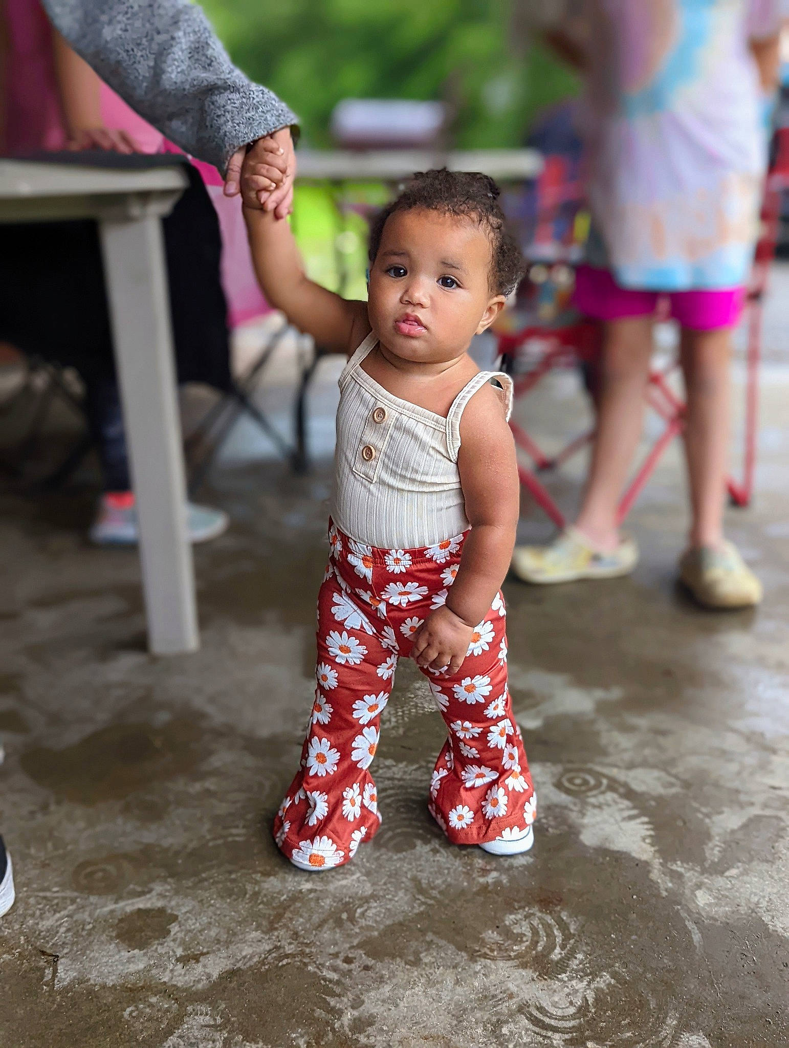 Talia is registered to the contest to win money with this photo: baby, baby_toddler_clothing, child, event, flooring, foot, fun, happy, head, human_leg, human_settlement, joint, leg, leisure, person, pink, shorts, skin, standing, thigh
