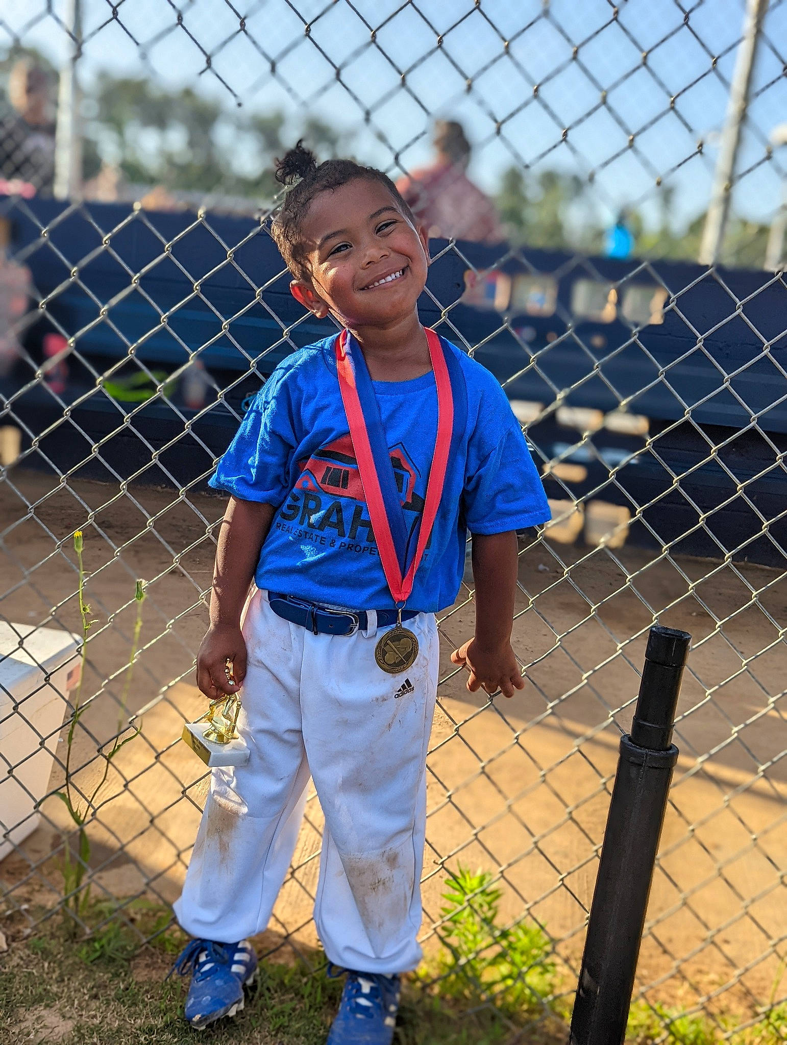 Tylan joined the competition — help win amazing prizes! baseball, baseball_field, baseball_player, bat_and_ball_games, chain_link_fencing, child, electric_blue, fence, fun, grass, joy, leisure, mesh, pattern, person, plant, player, sky, smile, sports