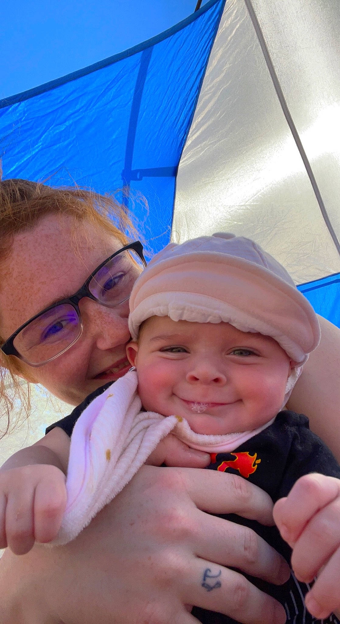 Quinn joined the competition — help win amazing prizes! baseball_cap, blue, cap, child, cool, face, facial_expression, finger, fun, gesture, glasses, happy, hat, headwear, joy, leisure, mouth, person, pink, recreation