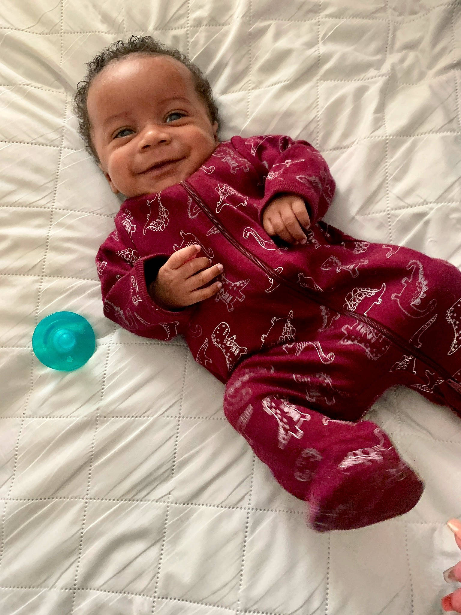 Cj joined the competition — help win amazing prizes! baby, baby_toddler_clothing, child, comfort, face, facial_expression, happy, head, joy, linens, magenta, pattern, person, pink, purple, sitting, skin, sleeve, smile, t_shirt