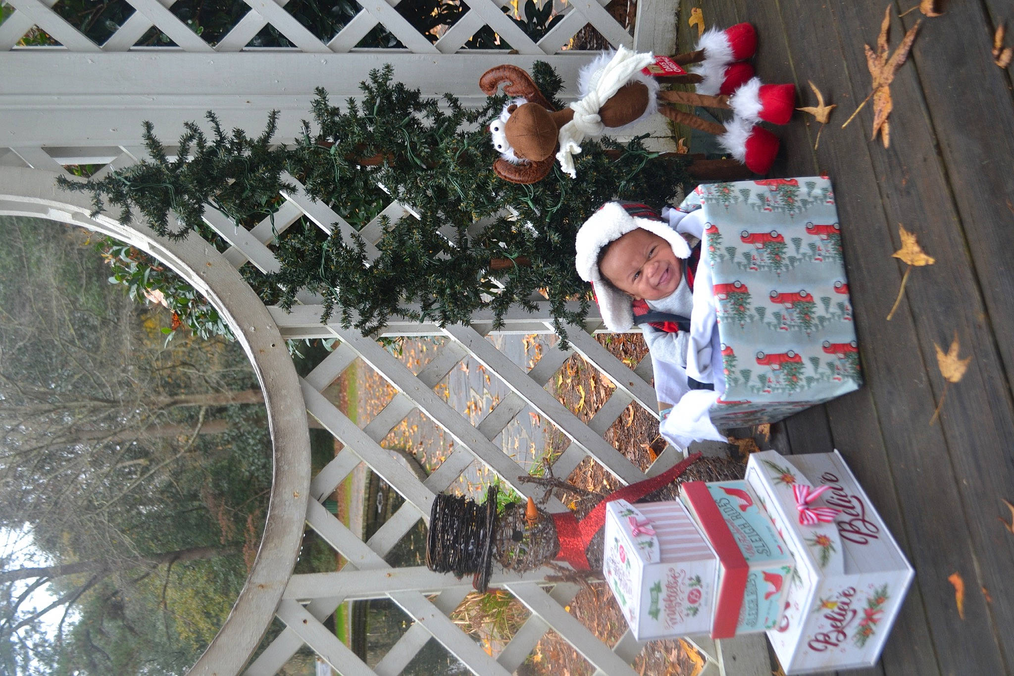 Cj is registered to the contest to win money with this photo: architecture, carmine, christmas, christmas_decoration, christmas_eve, christmas_ornament, christmas_tree, conifer, event, fun, holiday, holiday_ornament, interior_design, ornament, person, plant, tradition, tree, winter, wood