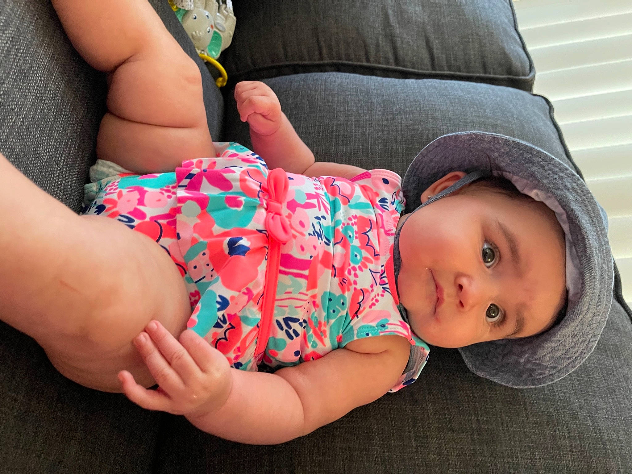 Sofia joined the competition — help win amazing prizes! baby_toddler_clothing, cheek, comfort, cool, couch, finger, grass, hand, headwear, human_body, joint, knee, leg, mouth, nail, person, product, skin, sleeve, textile