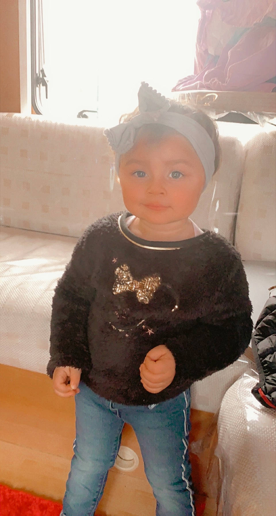 Maliana participe au concours pour gagner de l'argent avec cette photo : baby_toddler_clothing, cap, cheek, child, cool, eyewear, fashion_accessory, fun, happy, head, jeans, jewellery, neck, person, personal_protective_equipment, sitting, skin, sleeve, thigh, toddler