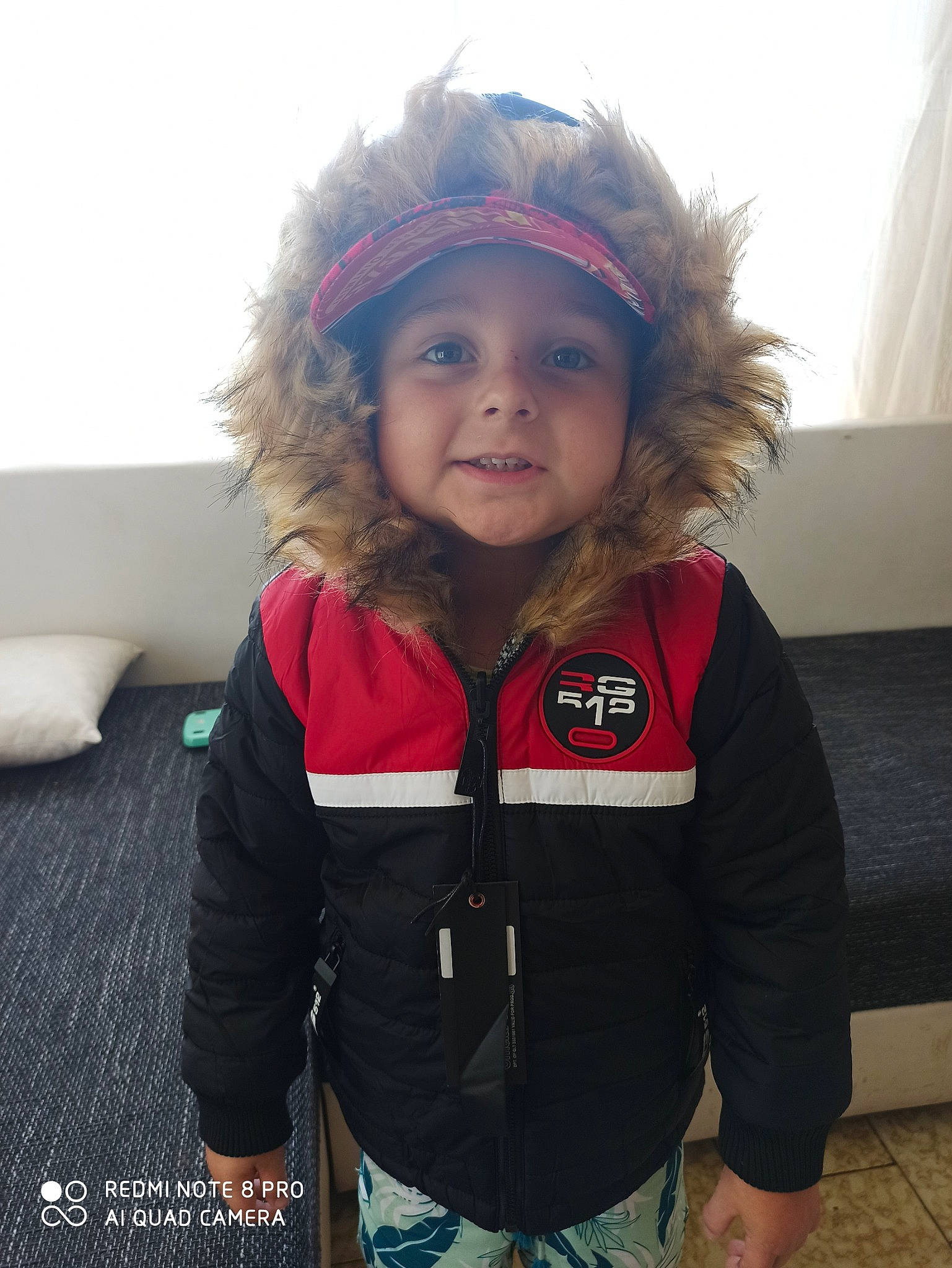 Nolan a rejoint le concours — aidez-le/la à gagner de superbes lots ! baby, cheek, child, child_model, cool, eye, face, head, headgear, headwear, helmet, iris, jacket, outerwear, person, personal_protective_equipment, photography, skin, sleeve, smile