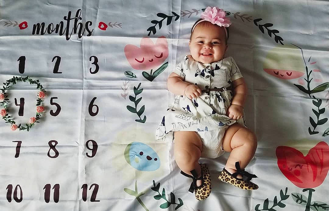 Olivia Jane is registered to the contest to win money with this photo: baby, child, cool, font, joy, pattern, person, photography, pink, play, smile, toddler