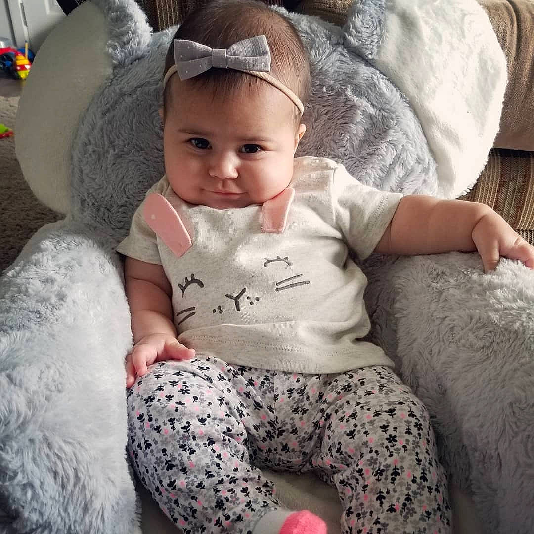 Olivia Jane joined the competition — help win amazing prizes! baby, baby_products, baby_toddler_clothing, child, ear, hair_accessory, head, person, pink, product, skin, sleeve, smile, toddler