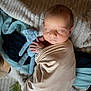 Jules a rejoint le concours — aidez-le/la à gagner de superbes lots ! newborn, baby, swaddled, sleeping, teddy_bear, knitted_toy, blanket, soft_texture, cozy, rest, infant, cute, peaceful, wrapped, portrait, child, homedecor, fabric, hand, closeup