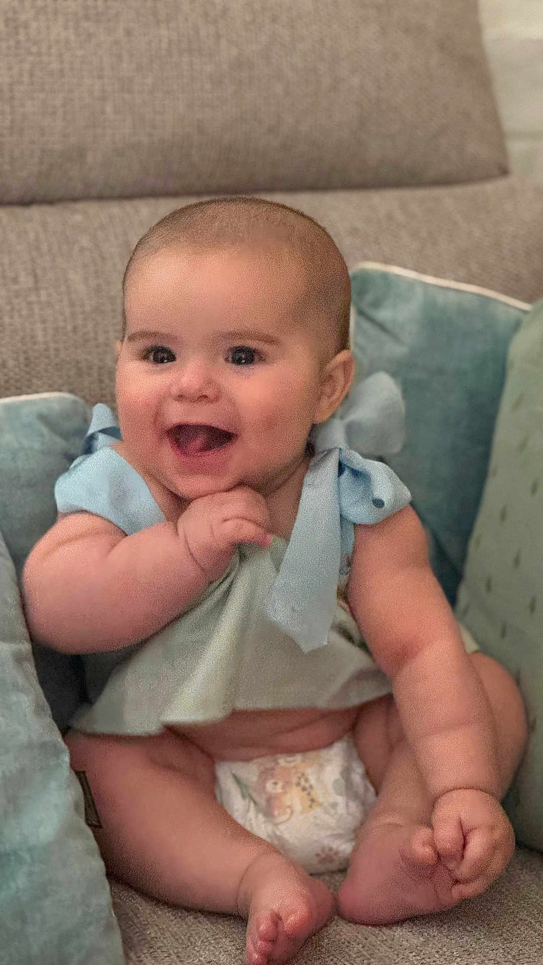 Christian participe au concours pour gagner de l'argent avec cette photo : baby, child, smiling, happy, diaper, cushion, blue_clothing, sitting, cute, infant, indoor, skin, face, hand, foot, portrait, young, plush, comfort, joy