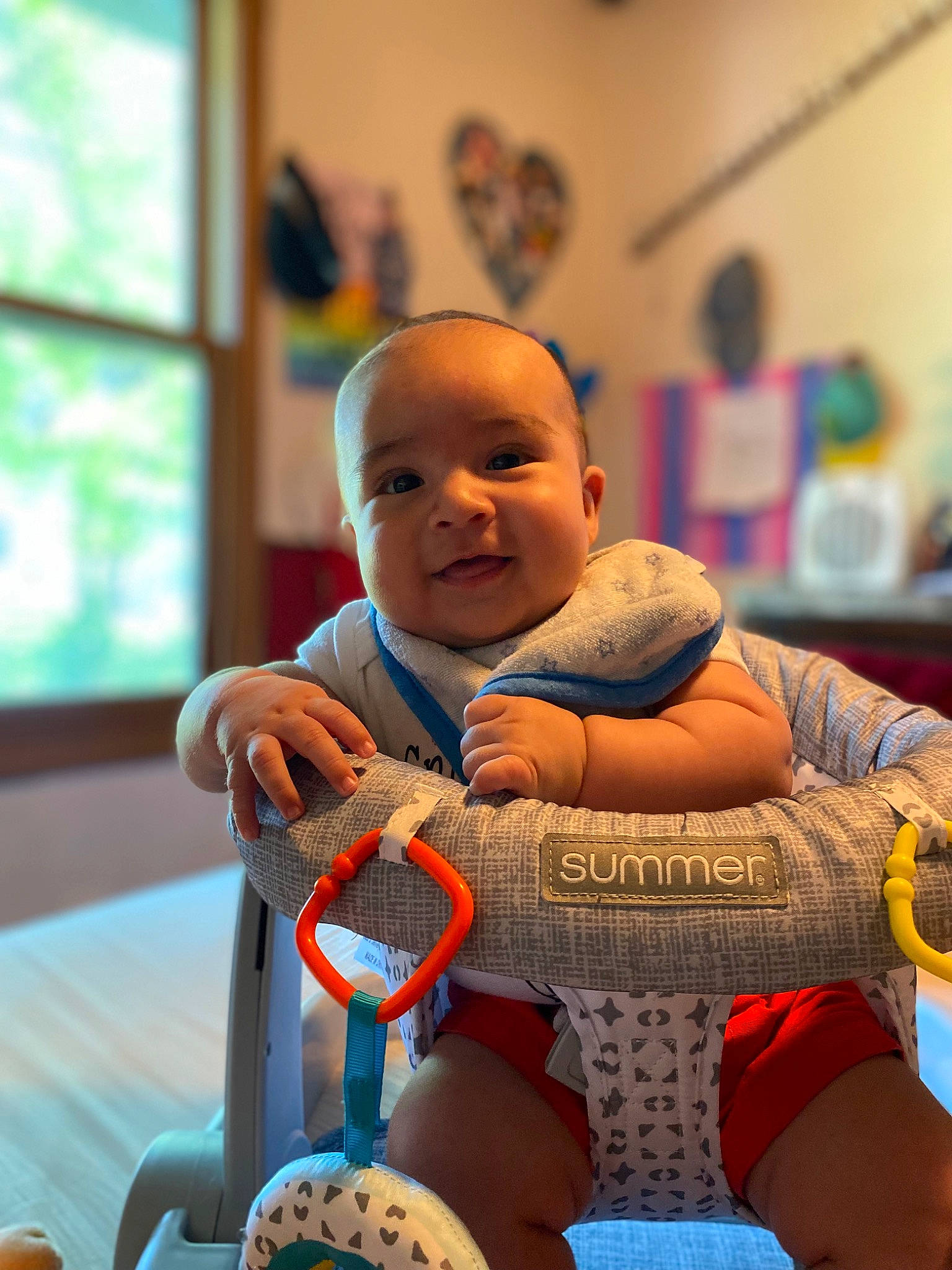 Leonidas is registered to the contest to win money with this photo: baby, baby_products, baby_safety, baby_sleeping, baby_toddler_clothing, baby_toys, chair, child, comfort, fun, happy, leisure, person, play, room, sitting, smile, toddler, vacation, window