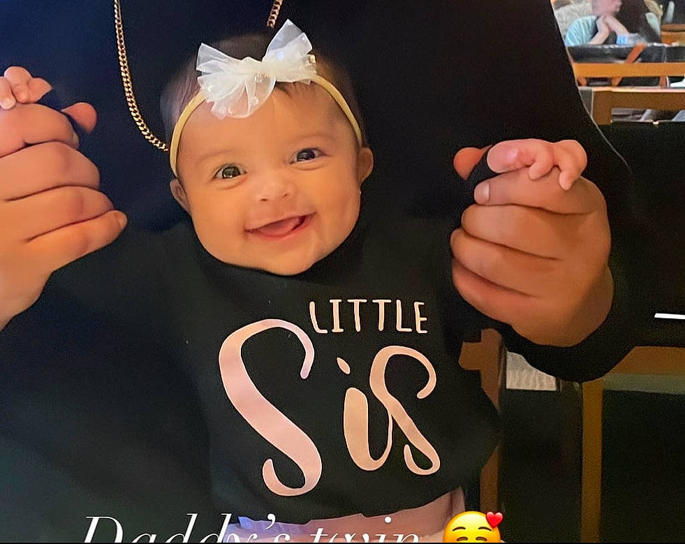 Anaya joined the competition — help win amazing prizes! baby, baby_toddler_clothing, child, cool, costume_hat, event, facial_expression, fashion_accessory, font, fun, gesture, happy, headpiece, headwear, joy, party_supply, person, pink, sleeve, smile