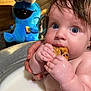 Asher joined the competition — help win amazing prizes! baby, milk_bath, cookie, blue_eyes, plush_toy, blue_cookie_monster, hand, wet_hair, infant, bath, curious, holding, snack, kitchen_counter, wooden_background, cute, child, soft_light, indoor, playful