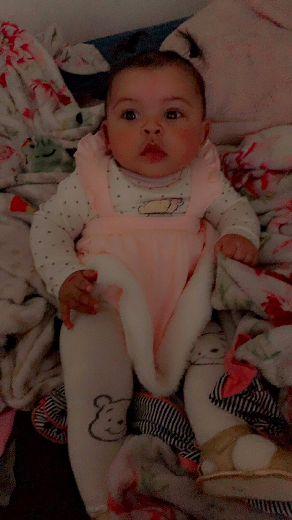 Charleigh is registered to the contest to win money with this photo: arm, baby, baby_toddler_clothing, cheek, dress, eye, eyebrow, face, facial_expression, finger, hairstyle, hand, iris, lip, mouth, person, pink, skin, sleeve, stomach