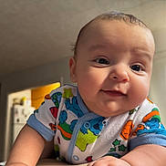 Brody joined the competition — help win amazing prizes! baby, infant, face, smile, onesie, colorful_clothing, cute, indoor, child, portrait, skin, head, arm, happy, young, person, baby_girl, baby_boy, expression, closeup