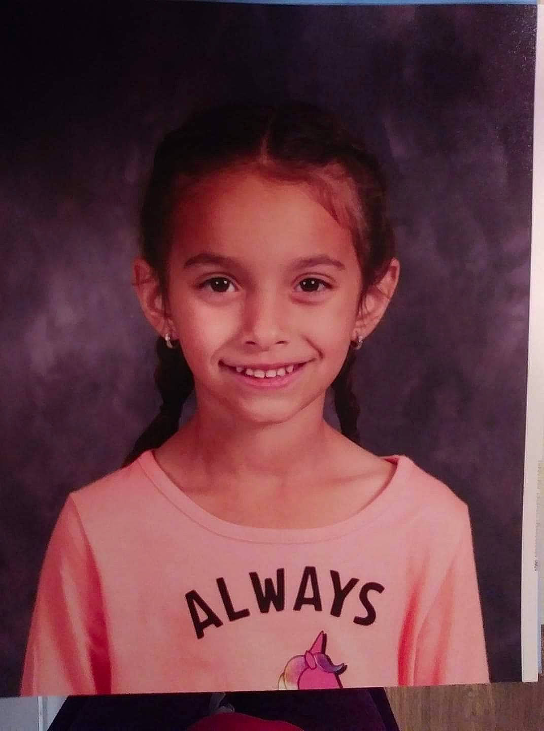 Eva is registered to the contest to win money with this photo: cheek, child, chin, eyebrow, face, forehead, hairstyle, happy, joy, neck, person, photography, portrait, smile, t_shirt