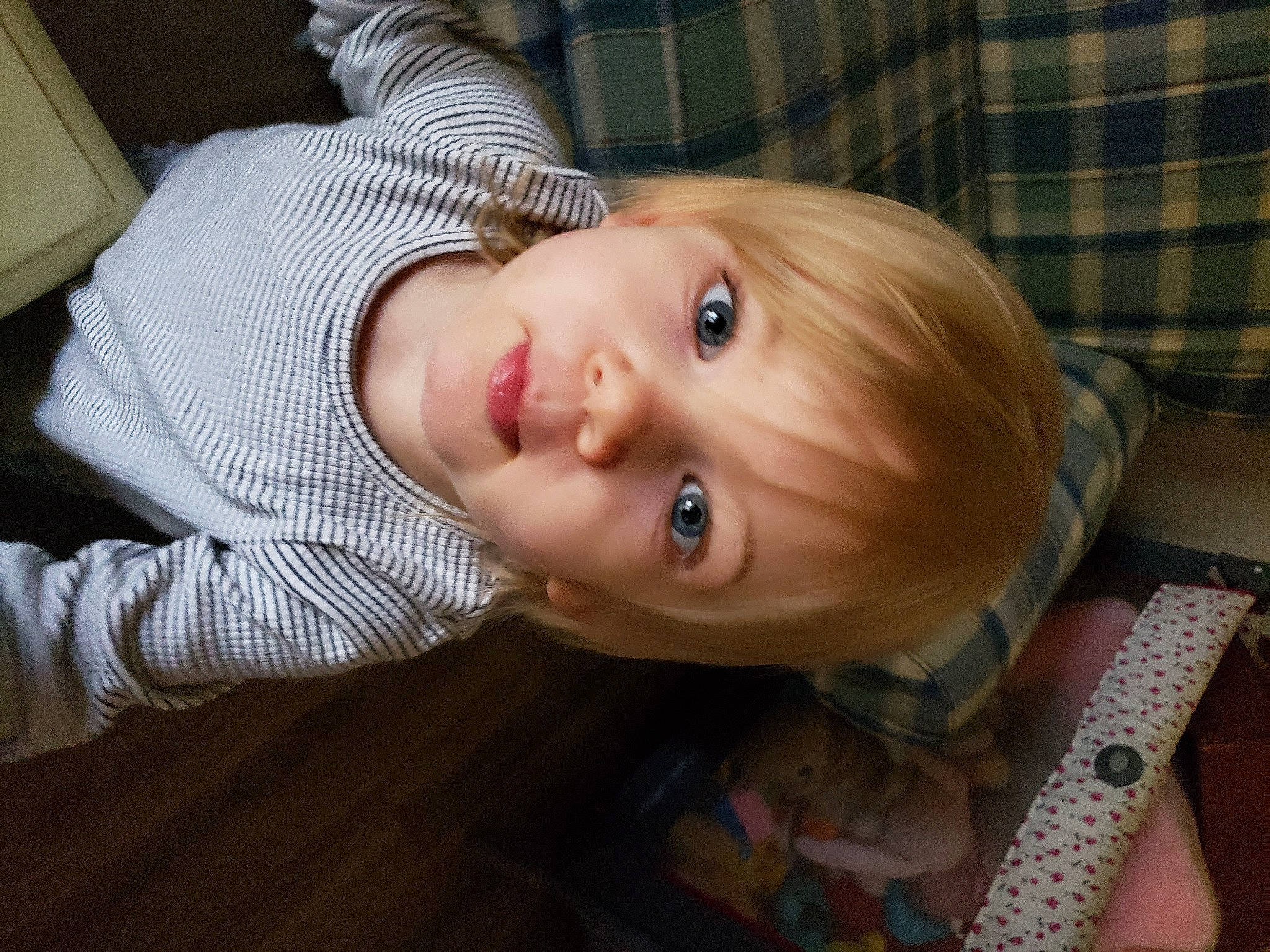 Abigail is registered to the contest to win money with this photo: baby, baby_toddler_clothing, blond, cheek, child, eyelash, fun, happy, iris, jewellery, lip, mouth, nose, person, room, sitting, skin, smile, toddler, toy