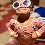 Zylah Brown joined the competition — help win amazing prizes! child, toddler, sunglasses, pink_pajamas, standing, hands_on_hips, indoor, floor_tiles, minion_pattern, smile, face, clothing, person, cute, dirt_smudge, funny, playful, head, eyewear, expression