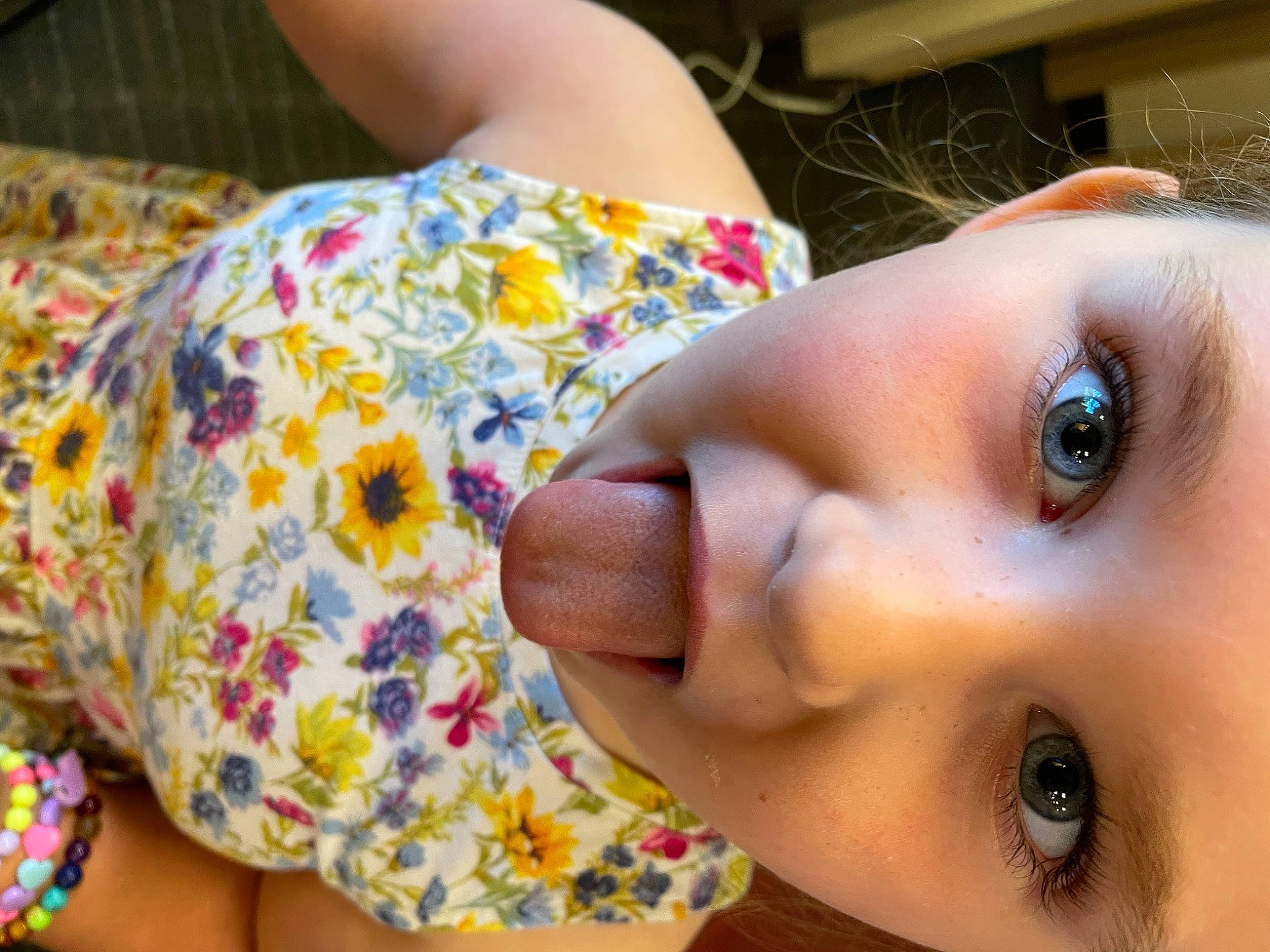 Ellie is registered to the contest to win money with this photo: cheek, eye, eyelash, finger, gesture, glasses, happy, human_body, iris, lip, mammal, mouth, neck, nose, organ, person, plant, skin, smile, vertebrate