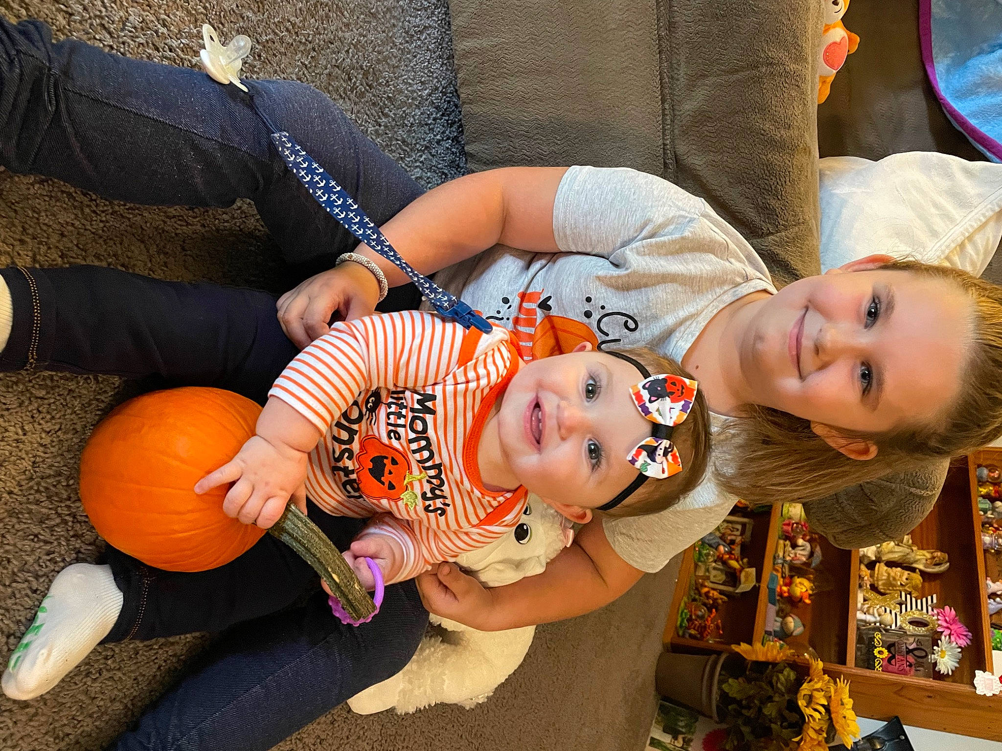 Alina joined the competition — help win amazing prizes! arm, baby, baby_toddler_clothing, calabaza, child, comfort, event, fun, gourd, happy, hat, headwear, joy, lap, mammal, orange, person, plant, pumpkin, sitting