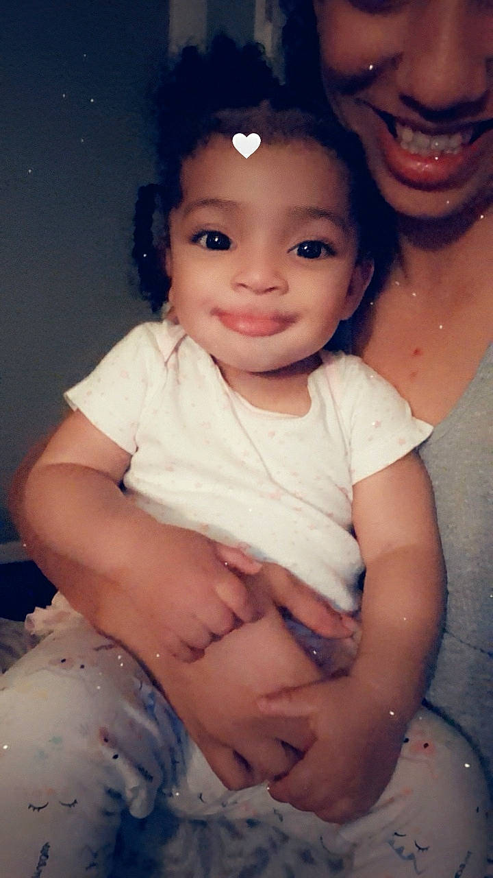 Serenity is registered to the contest to win money with this photo: baby, beauty, black_hair, cheek, child, chin, eye, eyebrow, face, forehead, fun, head, iris, joy, lip, mouth, muscle, nose, person, skin