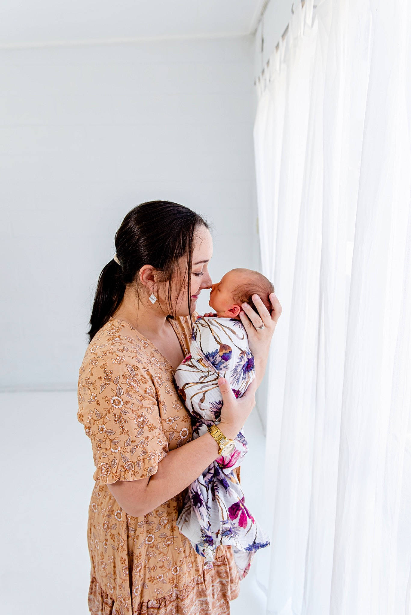 Aliana is registered to the contest to win money with this photo: baby, child, comfort, curtain, dress, event, fashion_design, flash_photography, formal_wear, gesture, happy, hug, jewellery, love, magenta, pattern, peach, person, photo_shoot, portrait_photography