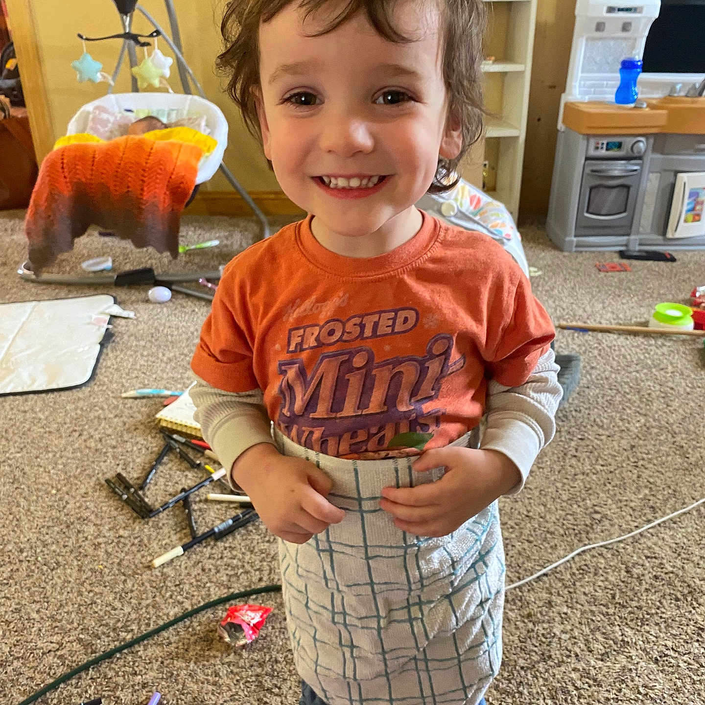Russell is registered to the contest to win money with this photo: boy, child, clothing, computerhardware, electronics, face, furniture, hardware, head, male, monitor, pen, person, photography, plant, portrait, pottedplant, screen, shorts, t_shirt