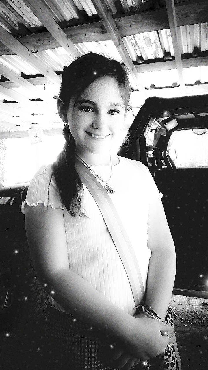 Isabella joined the competition — help win amazing prizes! black_and_white, black_hair, chest, face, fashion, fashion_design, flash_photography, formal_wear, fun, happy, human_leg, jewellery, joy, monochrome, monochrome_photography, necklace, person, smile, standing, style