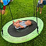 Kadence is registered to the contest to win money with this photo: baby, backyard, barefoot, casual_clothing, child, children, daylight, fun, grass, green, outdoor, playground, playhouse, recreation, relaxation, rope, summer, swing, toy, trampoline