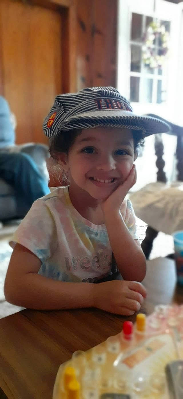 Vayda is registered to the contest to win money with this photo: chair, dress, event, fashion_accessory, fun, hairstyle, happy, hat, headgear, headwear, human, joy, leisure, person, recreation, sitting, skin, smile, summer, sun_hat