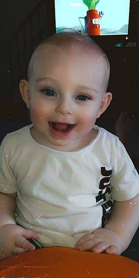 Carsyn is registered to the contest to win money with this photo: baby, baby_toddler_clothing, cheek, child, eyelash, fun, happy, head, human_body, iris, joy, lip, mouth, nose, person, sitting, skin, sleeve, smile, t_shirt