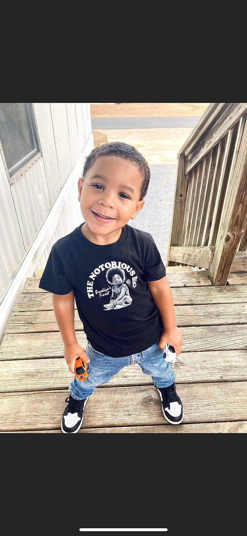 Dakota Shown Secrest is registered to the contest to win money with this photo: baby_toddler_clothing, child, denim, electric_blue, flash_photography, flooring, footwear, fun, happy, hardwood, joy, leg, leisure, pattern, person, shoe, sitting, sleeve, smile, t_shirt