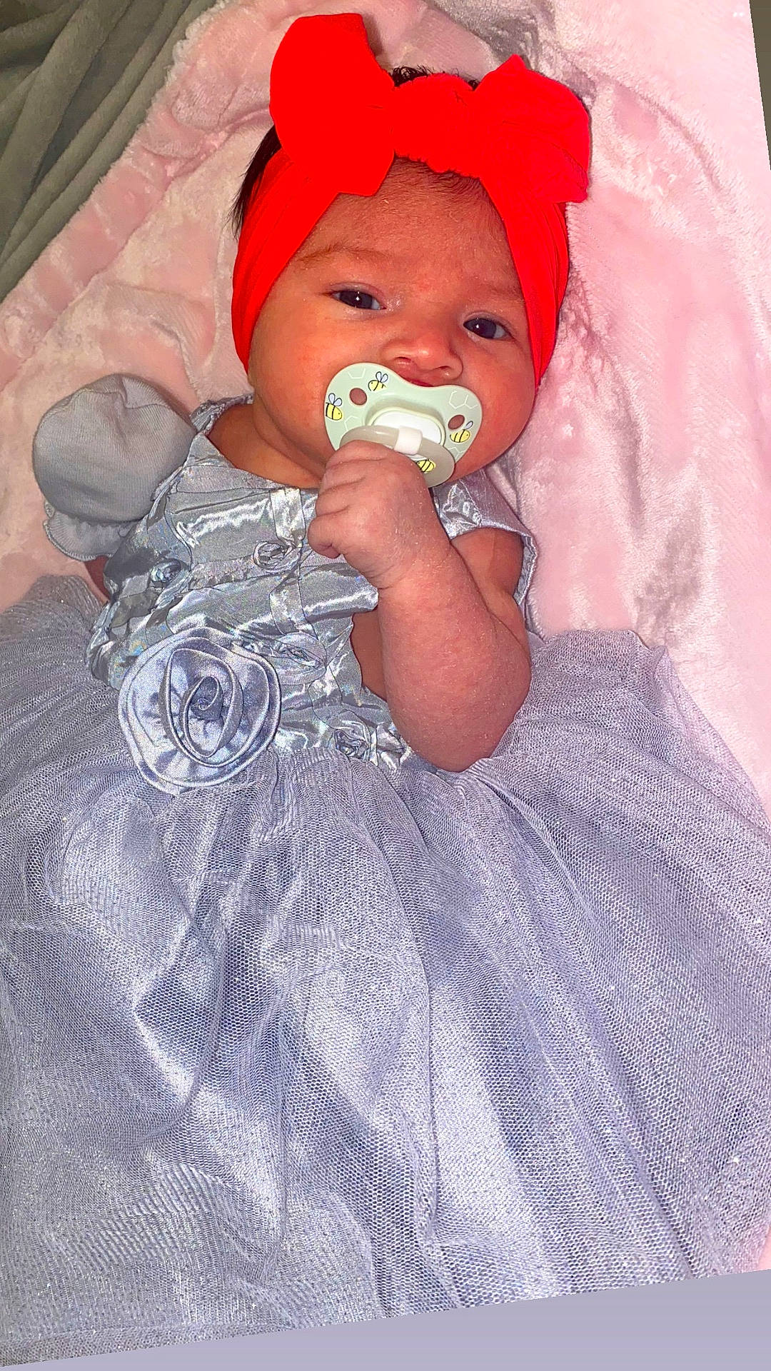 accessories, baby, bed, bodypart, bonnet, cap, clothing, costume, dress, face, finger, furniture, hand, hat, head, newborn, person, photography, portrait, turban