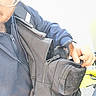 Zizou participe au concours pour gagner de l'argent avec cette photo : animal, backpack, black, brown, casual, closeup, cute, dog, face, glasses, hand, holding, jacket, outdoor, person, pet, resting, small_dog, travel, zipper