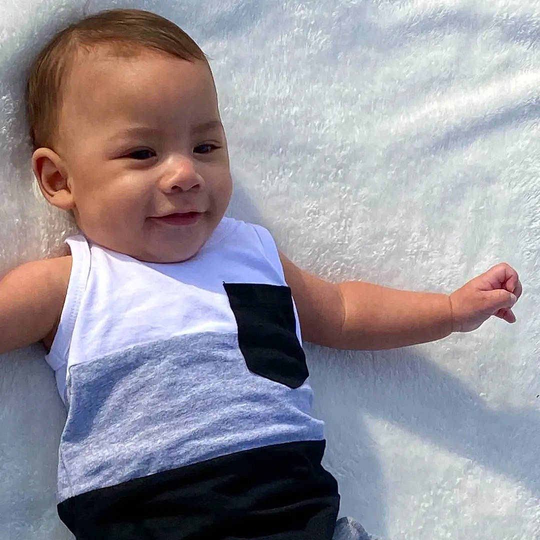 Armoni is registered to the contest to win money with this photo: baby, baby_toddler_clothing, chest, cool, elbow, eye, fun, gesture, happy, human_body, joy, neck, people_in_nature, person, skin, sleeve, smile, t_shirt, toddler, tree